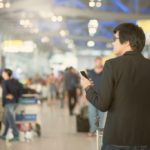 passenger walking through airport
