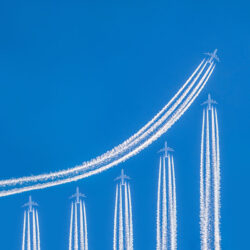 airplanes forming financial graph